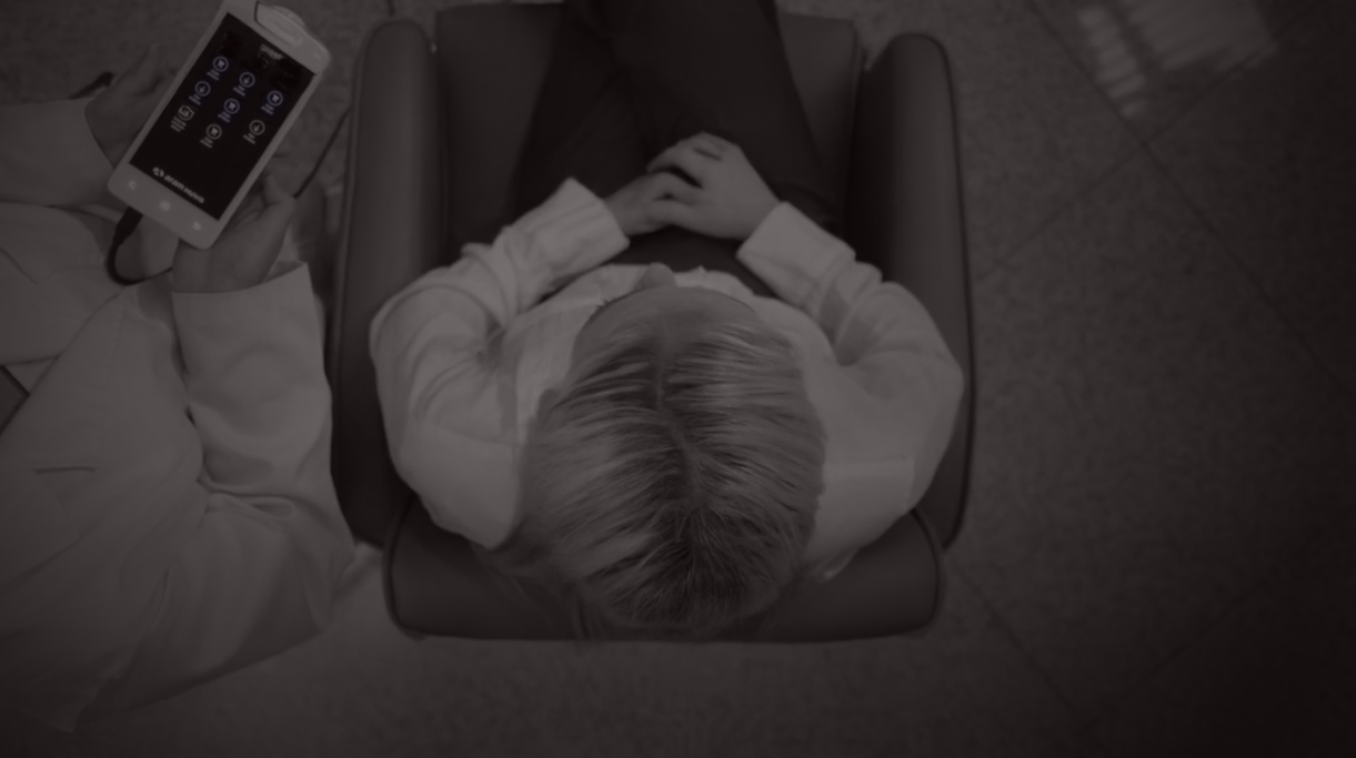 view of womans head from above with lines pointing to the different areas that are analyzed by the Trichoscope Ai System